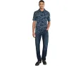 Поло TravisMathew Comfortknit Breeze с цветочным принтом