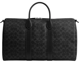 Сумка COACH Compass Bag 45 из фирменного холста с кожаными деталями и съемным ремнем