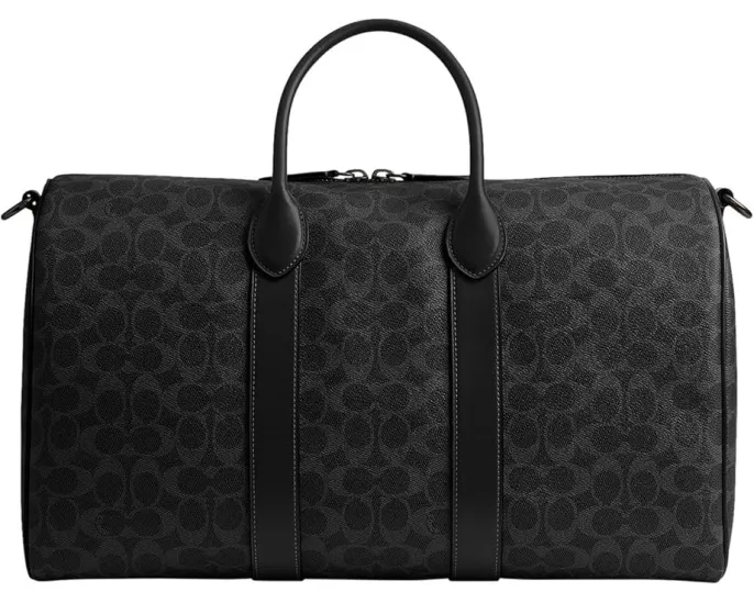 Сумка COACH Compass Bag 45 из фирменного холста с кожаными деталями и съемным ремнем