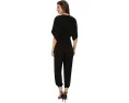 Norma Kamali Спортивный комбинезон Rectangle Jog с V-образным вырезом и короткими рукавами