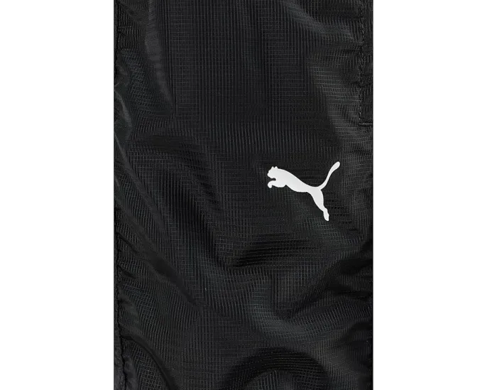 Брюки Dare To Woven от PUMA из водоотталкивающего рипстопа с резинками по низу