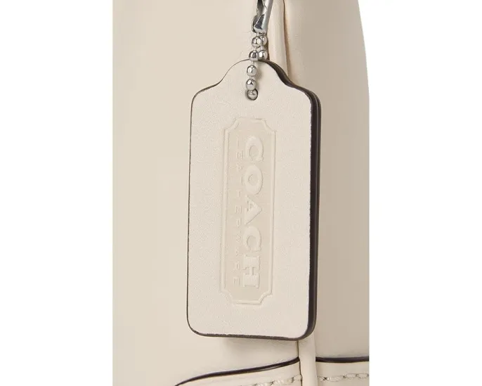 Сумка COACH через плечо из кожи с регулируемым ремнем