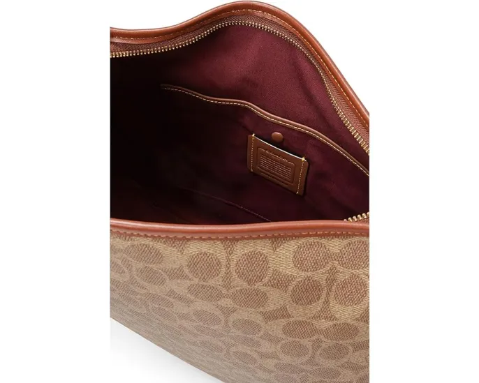 Сумка через плечо COACH Signature Cary из покрытого холста и телячьей кожи