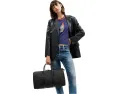 Сумка COACH Compass Bag 45 из фирменного холста с кожаными деталями и съемным ремнем