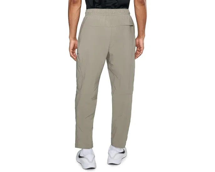 Брюки Nike Unlimited Dri-FIT Versatile Cargo с карманами и эластичным поясом