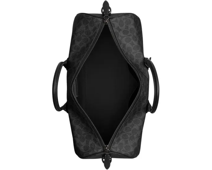 Сумка COACH Compass Bag 45 из фирменного холста с кожаными деталями и съемным ремнем