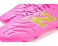 Бутсы New Balance Tekela Team Low Mg V5 розовые для скорости и контроля