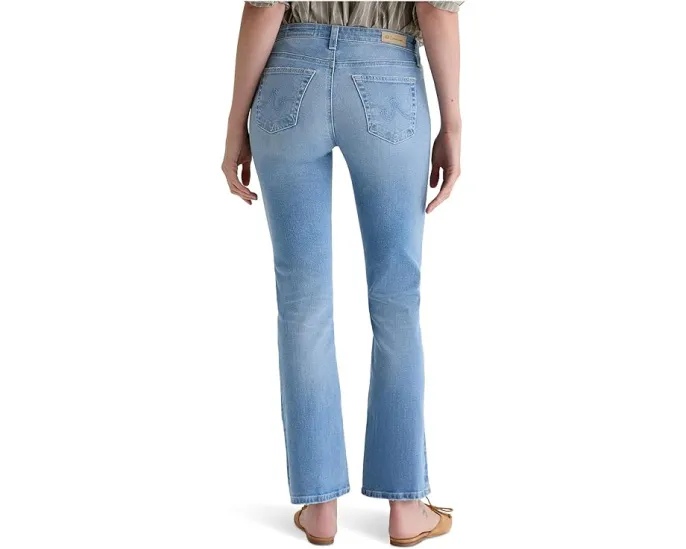 Джинсы AG Jeans Angel с низкой посадкой и расклешённым низом в стирке 14 Years Fortuna