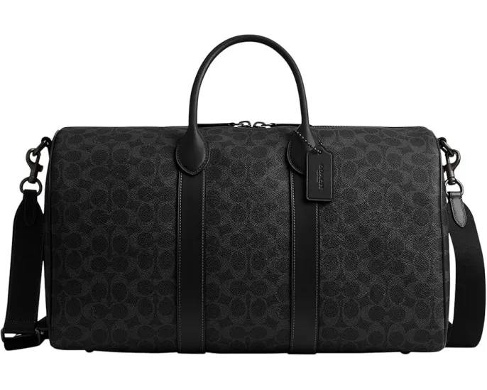 Сумка COACH Compass Bag 45 из фирменного холста с кожаными деталями и съемным ремнем