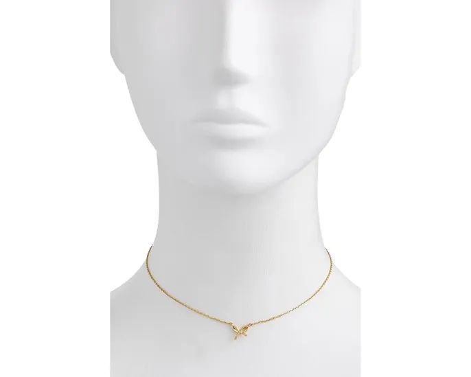 Мини-подвеска Girlie Pearlie Mini Bow Pendant от Kate Spade New York с бантиком
