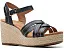 Сандалии Clarks Sabina Strap на клиновидном каблуке с перекрестными ремешками