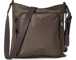 Кроссбоди Tumi Tyler с множеством карманов и съемным кожаным шармом