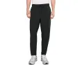Брюки Nike Unlimited Dri FIT с зауженным кроем и карманами на молнии