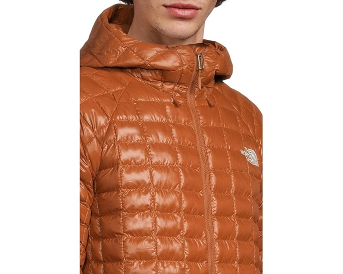 Куртка The North Face с капюшоном и синтетическим утеплителем THERMOBALL
