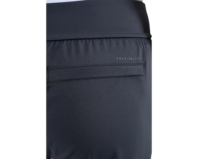 Брюки TravisMathew Moveknit Resilience с зауженным кроем и двумя карманами