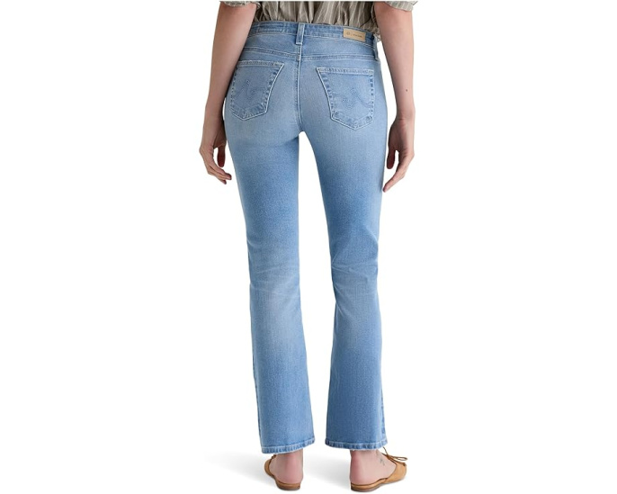 Джинсы AG Jeans Angel с низкой посадкой и расклешённым низом в стирке 14 Years Fortuna