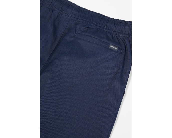 Брюки Lacoste из стрейч-твила для детей со средней посадкой