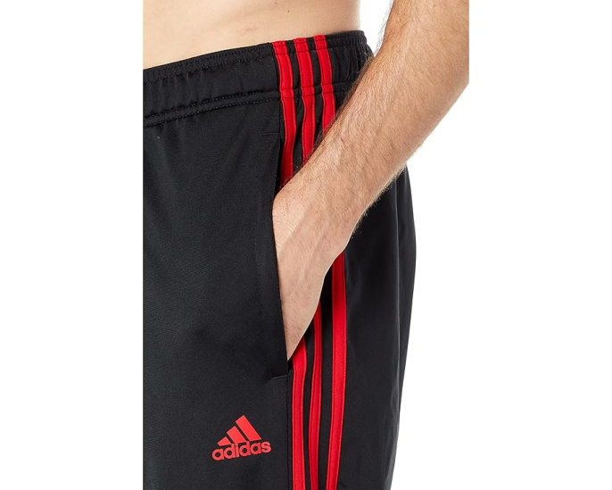 adidas Брюки Essentials с открытым подолом и полосками
