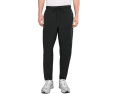Брюки Nike Unlimited Dri FIT с зауженным кроем и карманами на молнии